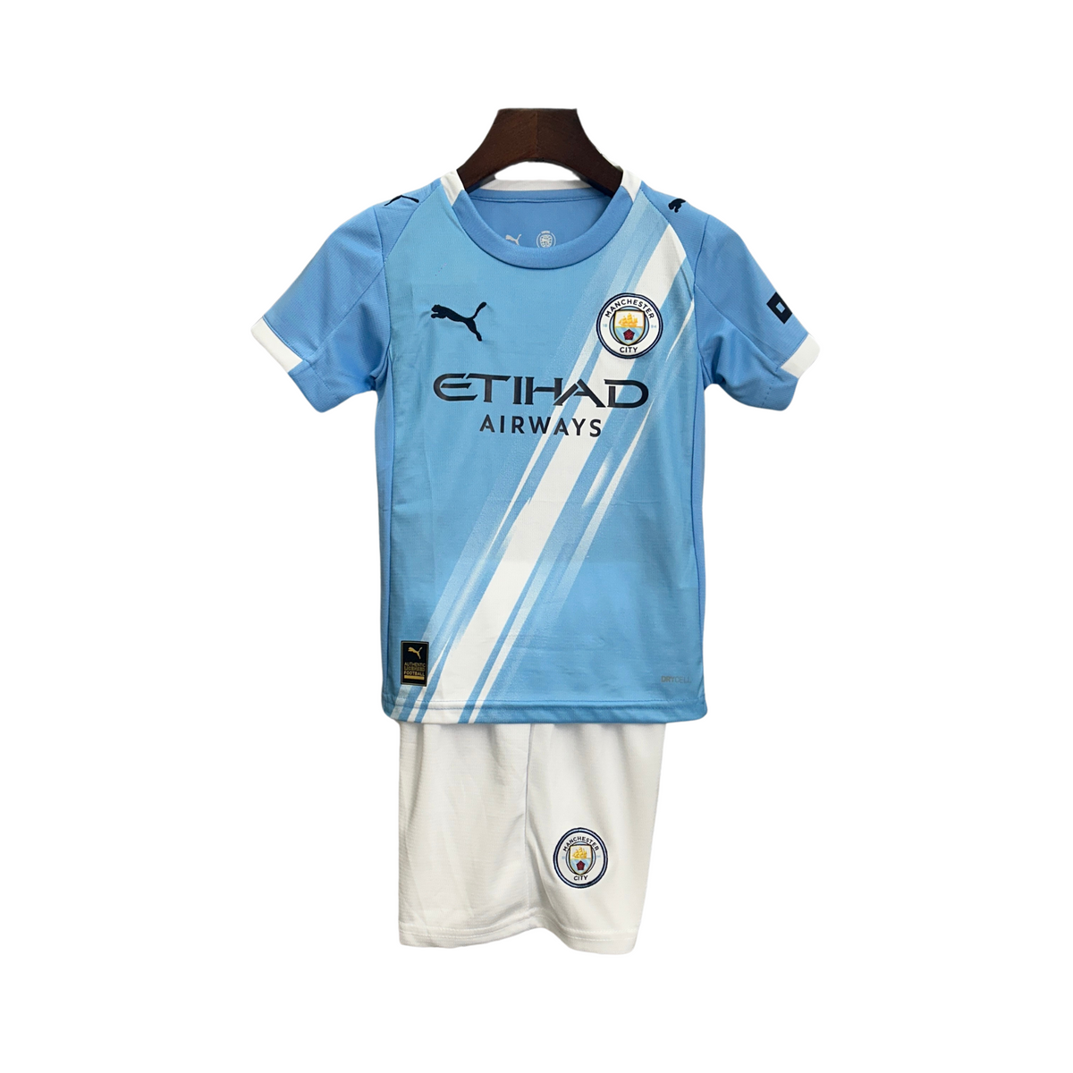 Kit infantil del Manchester City I 25/26 